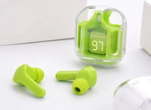Green earbuds with a charging case on a white surface